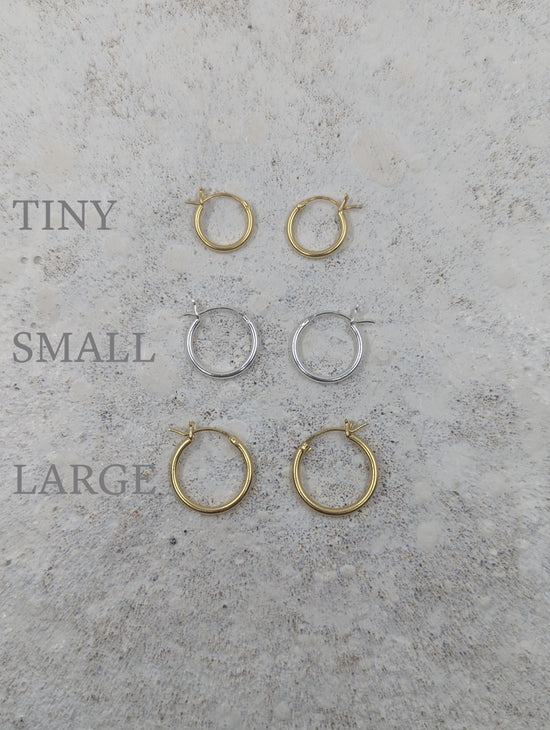 Load image into Gallery viewer, Tiny Hinged Huggies | Sterling Silver
