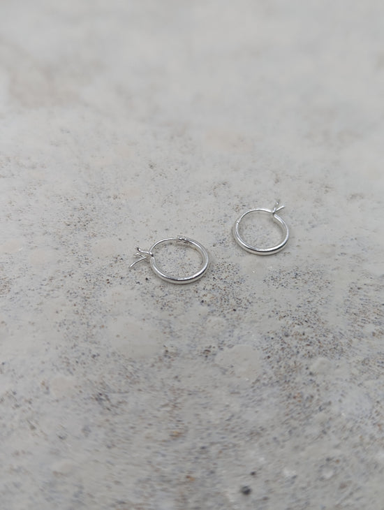 Load image into Gallery viewer, Tiny Hinged Huggies | Sterling Silver
